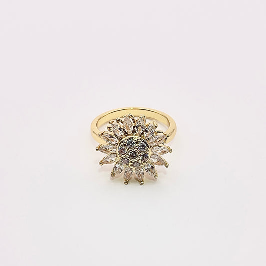 Front view of a stunning gold plated rotating sunflower zircon ring.